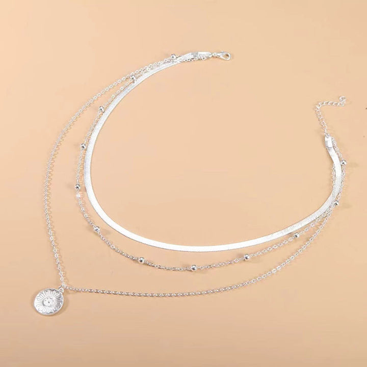 Halskette Eleganz Raffinesse Selbstvertrauen aufwendiges Design glänzendes Aussehen